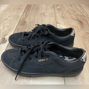 Black suede Adidas sleek sneakers